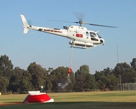 Heli-tanker uploading water Perth